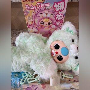 Baby Three hanging backpack with pacifier